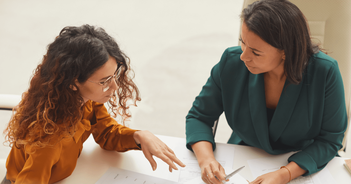 Person working with consultant on SOPs