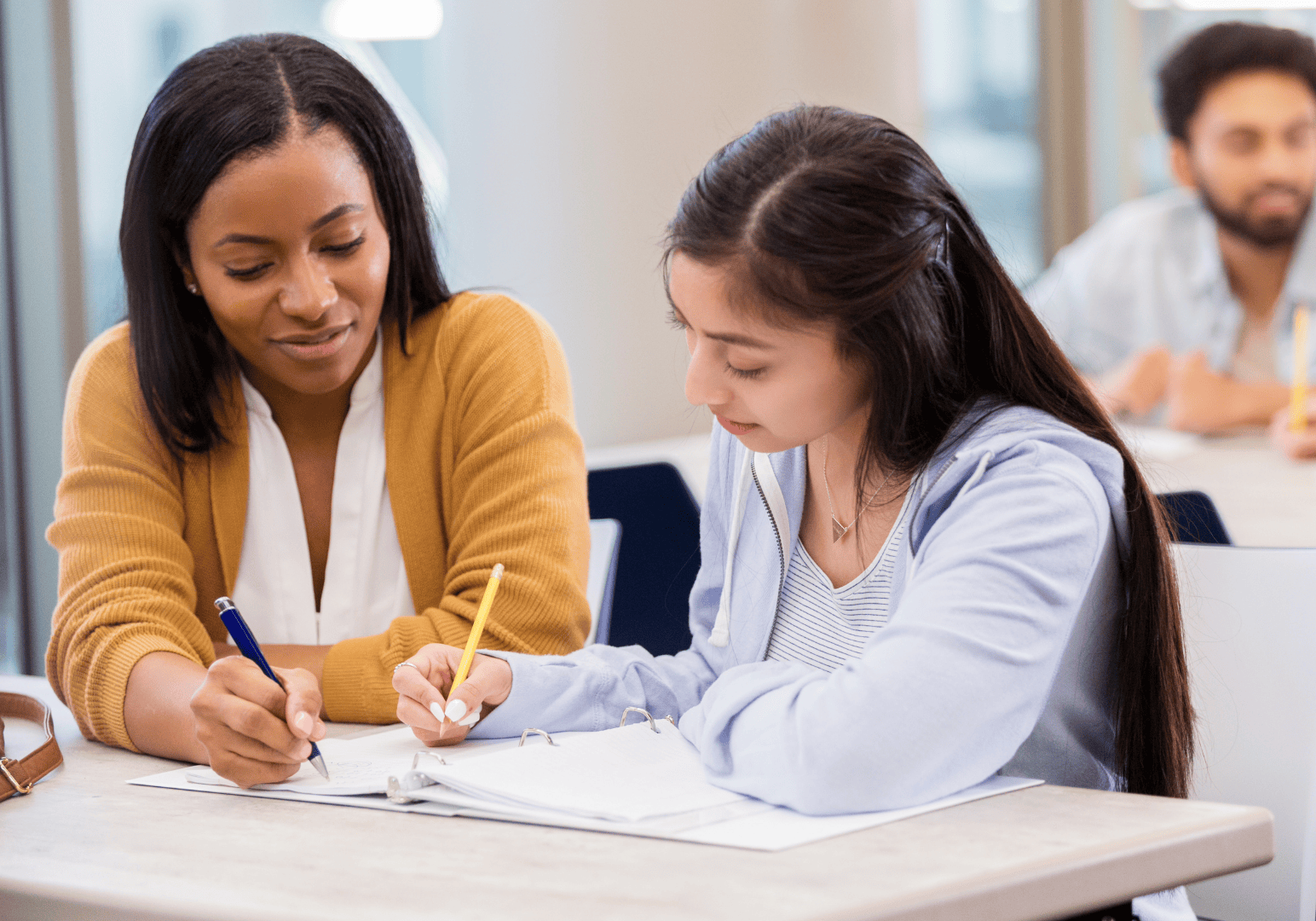 Teacher Helping Student